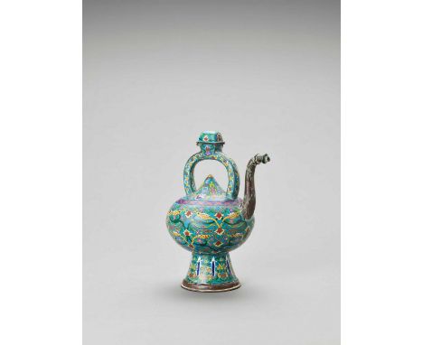   A CLOISONNE ENAMEL EWER, LATE QING  China, late Qing dynasty. The Cloisonne ewer with a bulbous body crafted with a spout, 