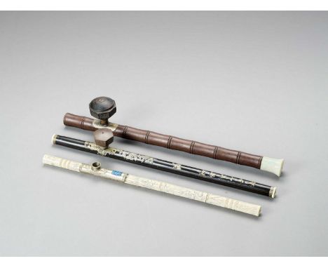   THREE OPIUM PIPES, LATE QING TO REPUBLIC  China, late Qing dynasty (1644-1912) to Republic period (1912-1949). One carved f