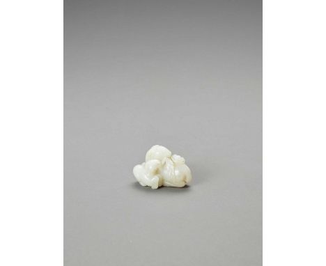   TWO RAMS JADE GROUP  China, Republic period (1930-1949). The near white colored stone carved with a ram and young grasping 