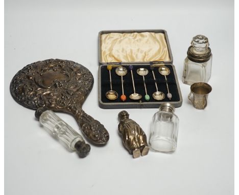 A Hanau silver novelty figural pepperette and other small silver including a silver mounted hand mirror, scent bottles and a 