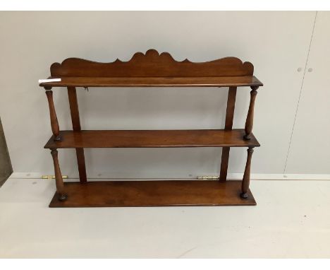 A Victorian mahogany three tier wall bracket, width 79cm, depth 16cm, height 56cm