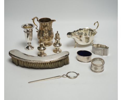 Sundry small silver including a silver sauceboat, George V sparrow beak cream jug, pair of pepperettes, napkin rings etc. and