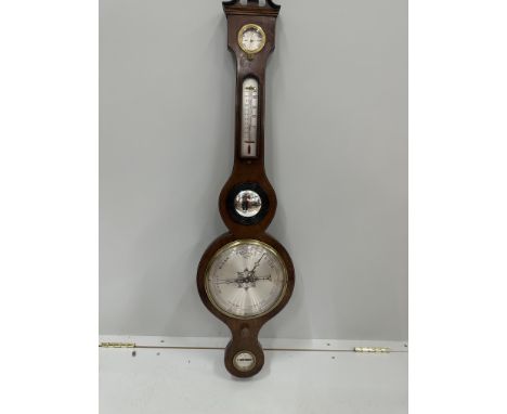 An early 19th century mahogany wheel barometer, height 98cm