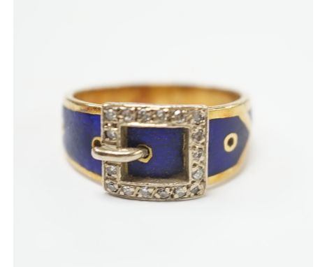 An early 20th century 18ct, diamond chip and blue enamel set buckle ring, size Q, gross weight 8.9 grams.