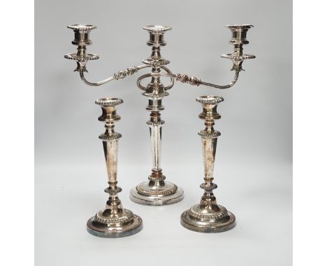 A Sheffield plate two branch, three light candelabra and a pair of  candlesticks, candelabra 36cm high