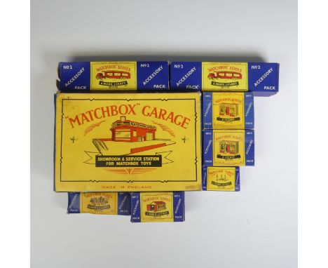 "Matchbox" Garage - Showroom &amp; Service Station, yellow and red, boxed, together with seven Accessory Packs: No.1 ‘Esso’ P