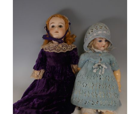 A Schoenau &amp; Hoffmeister bisque head Doll, blue glass sleeping eyes, open mouth with four upper teeth, pierced ears and b