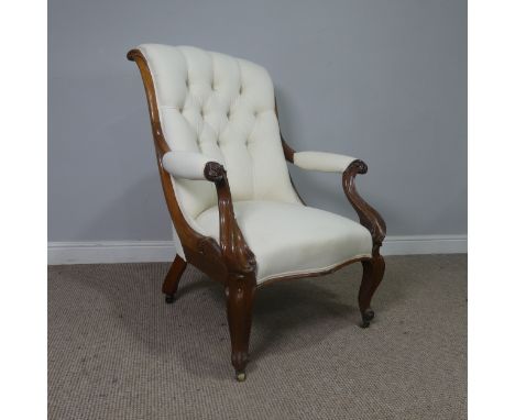A Victorian mahogany open Armchair, upholstered button back and scroll arms, above serpentine front seat, raised on cabriole 