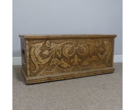 A carved Middle Eastern wooden Trunk / Chest, probably pine, carvings depicting mythical beasts and foliage, W 97.5 cm x H 43