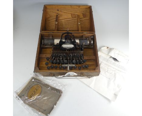 An antique American Blickensderfer No 5 Typewriter, in oak Box, with plaque 'No 5, Blickensderfer, Newcastle-on-Tyne, made in