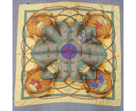 A Hermès&nbsp;silk twill scarf: 'Grande Tenue',&nbsp;designed by Henri d'Origny, on light orange ground, hand rolled edges, w