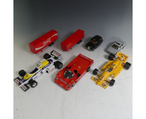 Corgi: a quantity of unboxed die cast model vehicles, mostly Corgi Juniors, together with five Burego 1/24th scale racing car