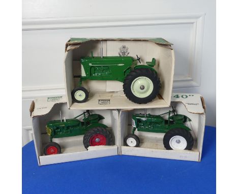 A boxed Spec-cast Oliver 880 Tractor in green, together with a Spec-cast green Oliver model 440 and a Oliver green super 44 m