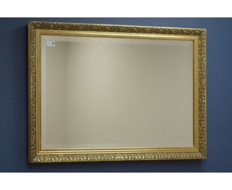 Rectangular bevel edged mirror in gilt frame, 86cm x 61cm   Condition Report   Click here for further images, condition, auct