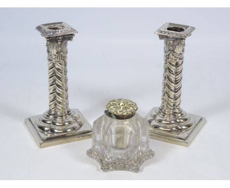 Pair of 19th/ early 20th Century silver-plated corinthium column candlesticks and a similar age glass inkwell with brass top 