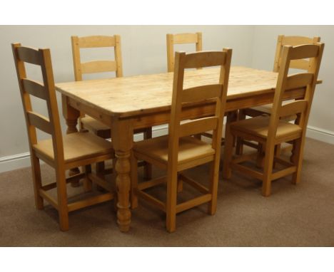 Rectangular pine farmhouse dining table (183cm x 91cm, H77cm), and six ladder back dining chairs   Condition Report   Click h