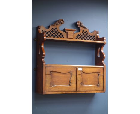 Victorian walnut wall hanging cupboard with shelf, break swan neck fretwork pediment, panelled doors, W61cm, H55cm   Conditio