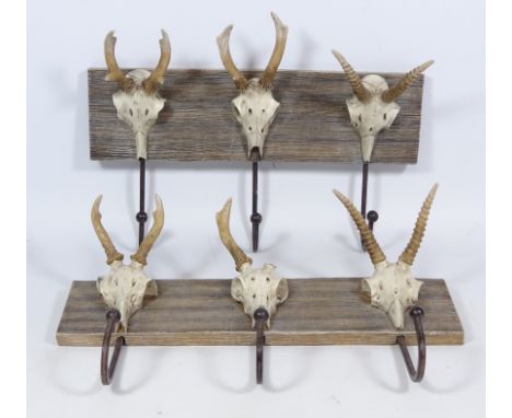 Two 'skull' three hook coat racks, W34cm   Condition Report   Click here for further images, condition, auction times & deliv