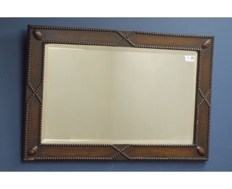 Edwardian rectangular oak mirror with beaded decoration, 74cm x 49cm   Condition Report   Click here for further images, cond