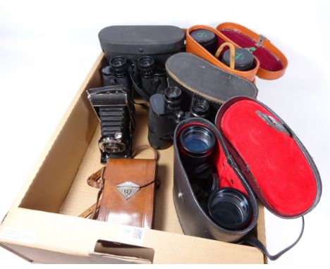 Two pairs of Greenkat 12x50 & 10x50 binoculars, Voigtlander Bessa folding camera, Prinz 10x50 binoculars and one other pair i