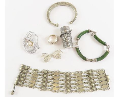 A green hard stone bracelet, a bangle, ring and other items