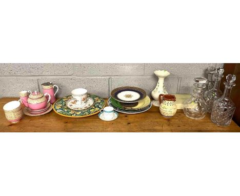 A collection of miscellaneous ceramics and glass including four 19th century decanters, motto ware, Dresden cup and saucer, R