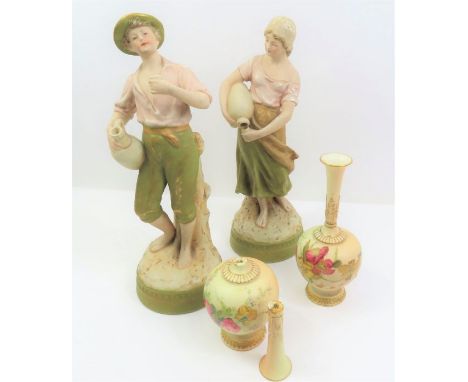 A pair of Royal Dux figures of water carriers 29cm high, along with a pair of Royal Worcester bottle vases 