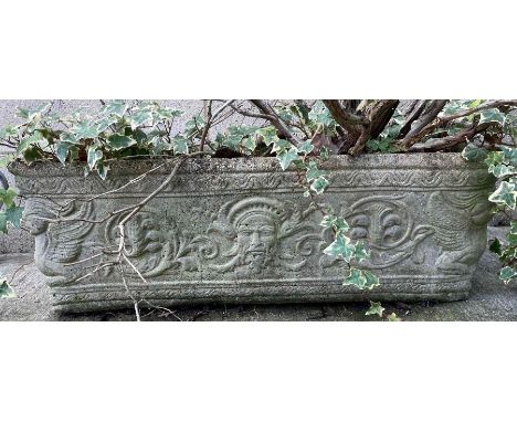 A decorative reconstituted stone trough planter, 24cm high, 63cm long, 23cm wide 