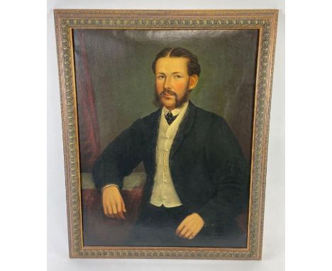 A 19th century portrait of a seated male, oil on canvas, 89cm x 69cm