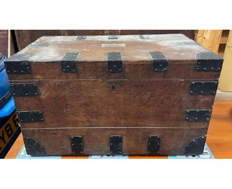 A 19th century oak and steel bound travelling trunk/box, with a hinged top, 38cm high, 66cm long, 37cm wide