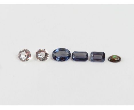 A quantity of loose gemstones - a pair of synthetic colour change sapphires, a boulder opal and other stones