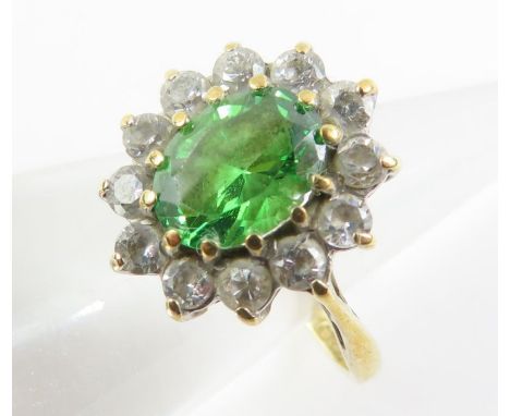 A 9ct gold green stone and cubic zirconia cluster ring, finger size M, 2.37g gross