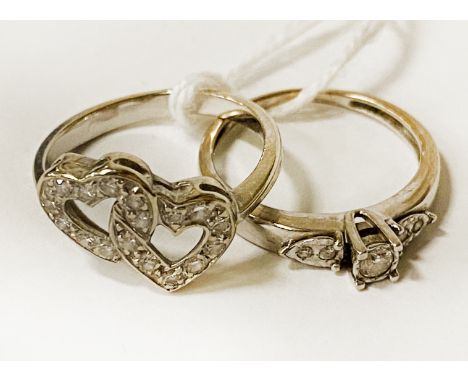 DIAMOND RING WITH 1 OTHER 4.91 GRAMS APPROX