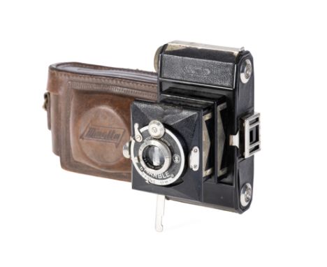 A Minolta 'Best' Marble Camera, 1934, with Nippon Coronar Anastigmat f/5.6 75mm lens, serial no. 37120, body, F-G, shutter wo