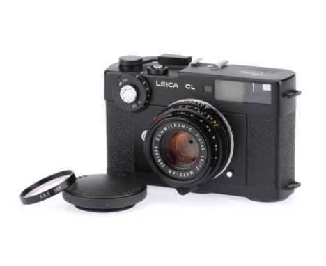 A Leitz Wetzlar Leica CL Compact 35mm Rangefinder Camera black, 1973-74, made in Japan, serial no.1330775, with a Leitz Summi