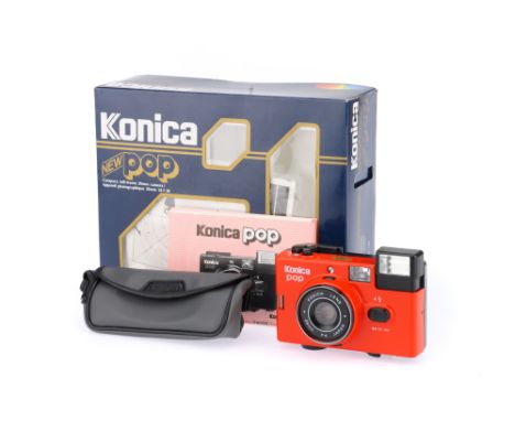 A Konica (New) Pop 35mm Compact Camera, red, serial no. 4087802, body VG-E, shutter &amp; flash working, optics VG, in maker'