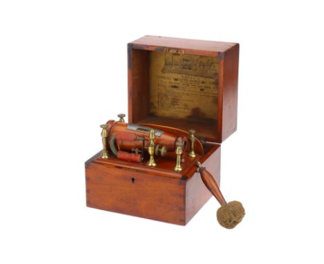 A Medical Coil by Griggs, c. 1875, electro-therapy device, the coil in a turned mahogany case with adjustable iron rod core, 