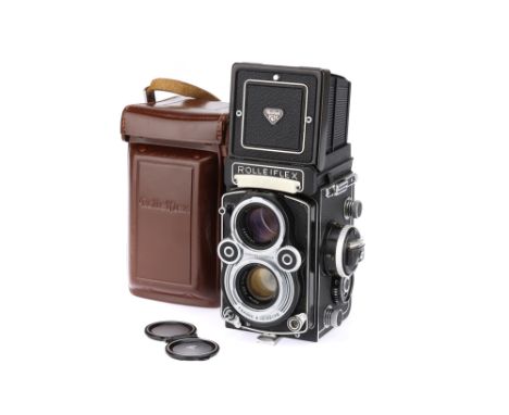 A Rollei Rolleiflex 3.5F Medium Format TLR Camera, black, serial no. 2827614, body F-VG, camera taken impact to focussing kno