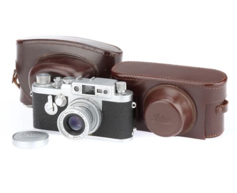 A Leitz Wetzlar Leica IIIg Delay 35mm Rangefinder Camera chrome, 1957, serial no.861814, with a Leitz Wetzlar Elmar f/2.8 5cm