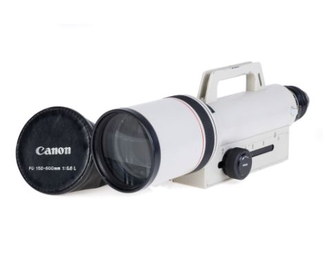 A Canon FD L f/5.6 150-600mm Lens, converted to Arri PL, white, serial no. 10317, body, G-VG, elements, G-VG, some light inte