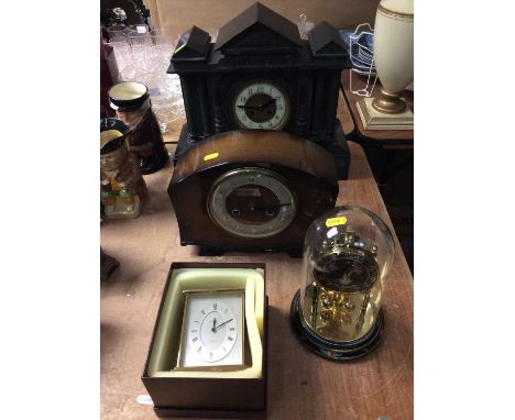 Victorian mantel clock in temple shape black slate case, Garrard brass carriage clock, anniversary clock and a mantel clock