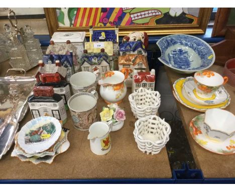 Group of Staffordshire pottery cottages, Shelley ceramics, a reproduction Blue and white barbers bowl and other ceramics