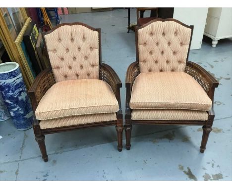 Pair of beech and caned button back armchairs