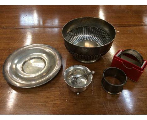 Group silver to include christening bowl, hallmarked London 1883, together with a saucer, two napkin rings, salt and salt spo