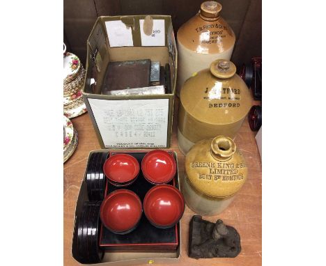 Three stoneware flagons, vintage glass negatives, Chinese red and black tea ware and a resin dog ornament
