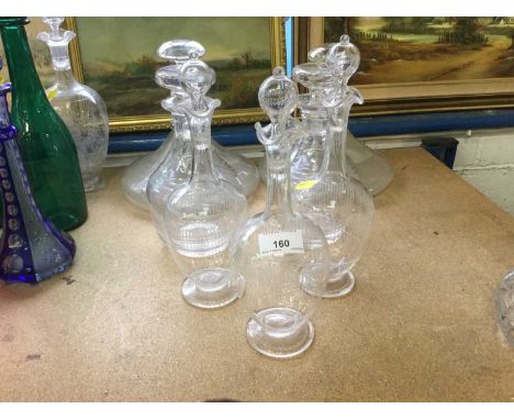 Pair of ring neck ships decanters, another pair of decanters and three Victorian etched decanters (7)