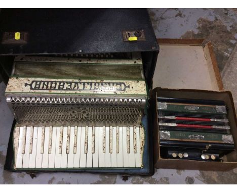 Piano accordion together with another in original box