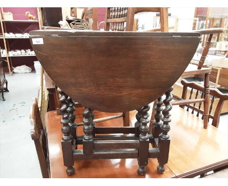 1920's oak drop leaf table on spiral twist legs