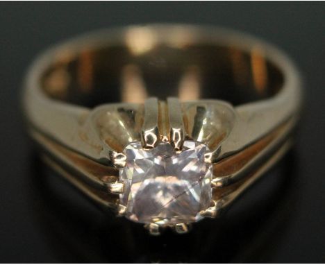 A gypsy set diamond ring, the cushion cut stone weighing approx. 1.40ct, hallmarked 9ct gold band, gross wt. 6.30g, size T.  