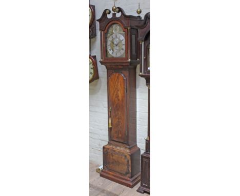 A George III 8 day mahogany long case clock, broken swan neck pediment with single brass finial, arched hood with brass mount